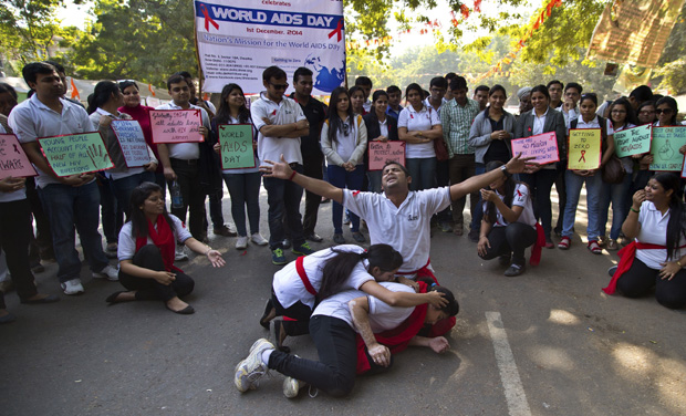 Students prepare a street play to create awareness of the dangers of HIV infections and ways to prevent it on the occasion of World AIDS Day in New Delhi (Photo: AP) Students prepare a street play to create awareness of the dangers of HIV infections and ways to prevent it on the occasion of World AIDS Day in New Delhi (Photo: AP)
